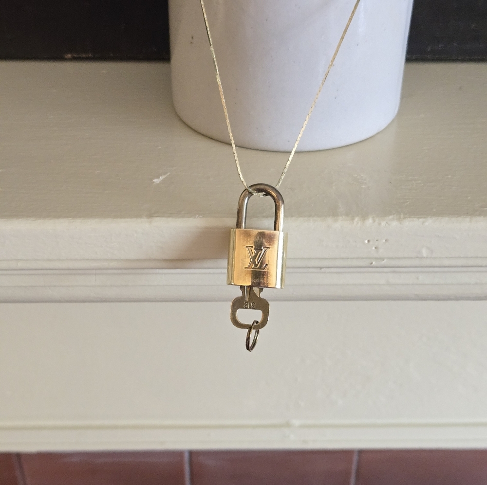 Louis Vuitton Gold Padlock with Key